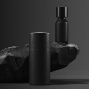 bottle-of-essential-massage-oil-on-stone-beauty-treatment-minimal-black-design-packaging-mock-up.jpg